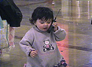little girl with mobile