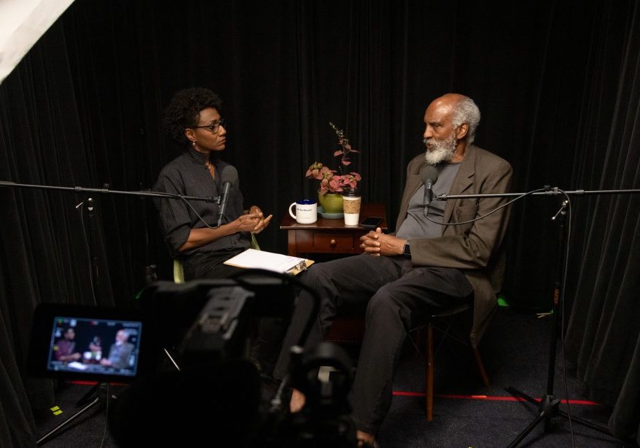 STAKES_NeEddra_john-3 UC Berkeley Professor john a. powell sits down with NeEddra James (’26) to explain how racism is, at its core, a story we’ve been taught to believe — one that authoritarianism exploits to divide and control. But he reminds us, “we can tell different stories” — stories that strengthen democracy instead of tearing it apart. (Photo credit: Hallie Applebaum)